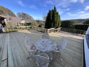 "Timber decking installed in St Austell garden by Build Maintain"